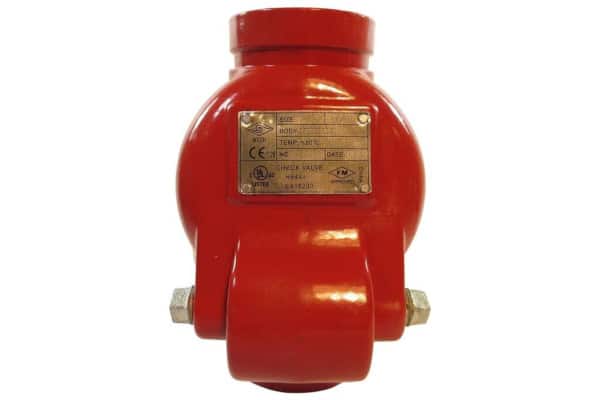 A 2.5 inch grooved check valve with informational plate