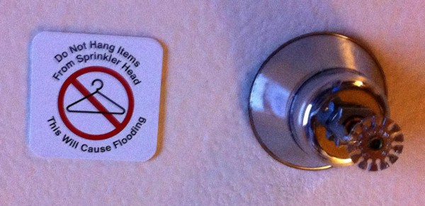 Sprinkler warning sign