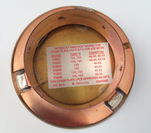 The inside of a Victaulic cover plate.