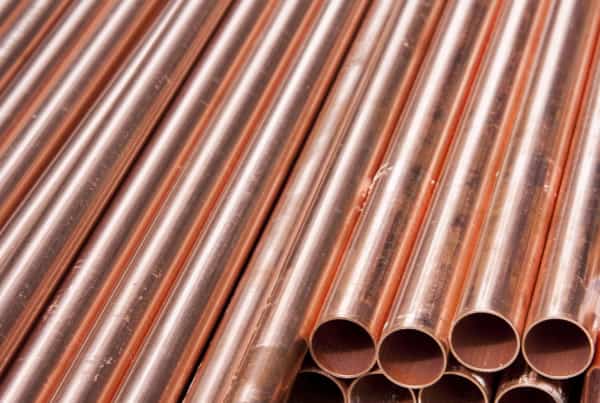 Stack of copper pipe