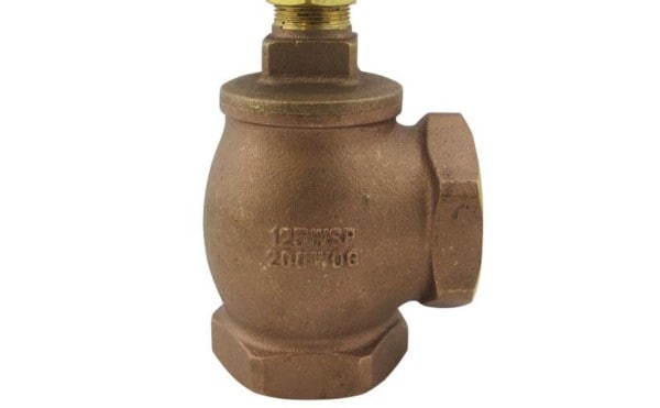 Close-up of stamped ratings on a valve