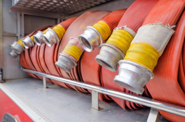 Fire hoses rolled on a fire truck