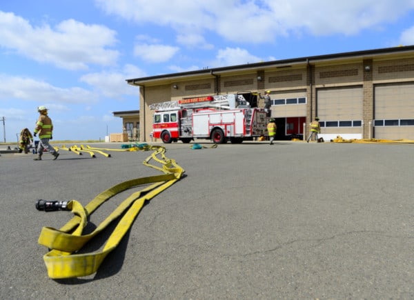 Fire hose stretched in front of a station