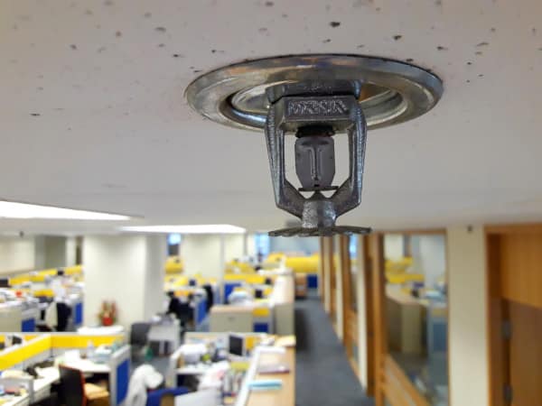 Fire sprinkler in office ceiling