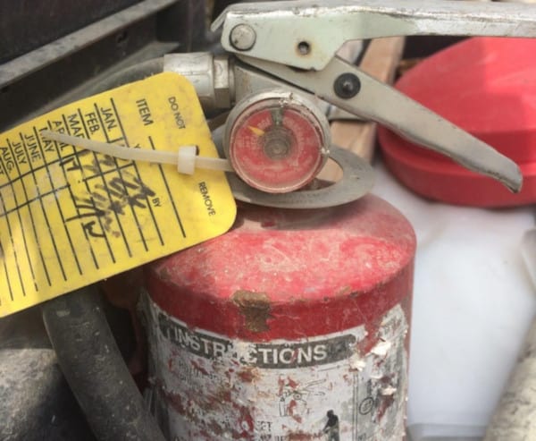 Worn out and dirty fire extinguisher