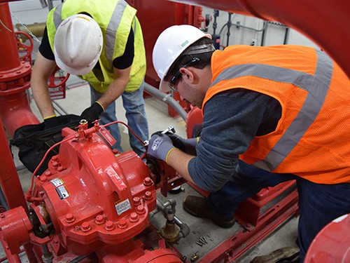 Contractors testing a fire pump