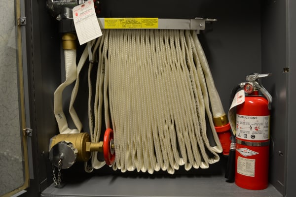 Installed fire hose rack