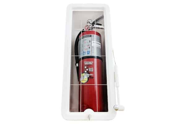 Fire extinguisher in white outdoor cabinet