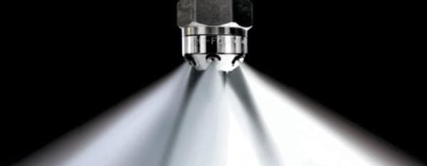 Water mist system nozzle spraying