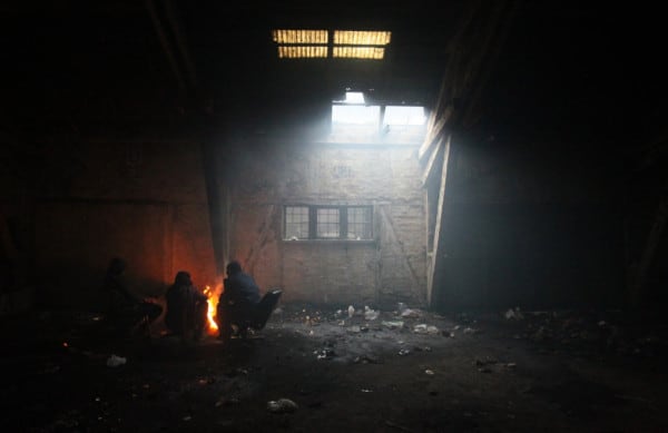 Abandoned building with homeless squatters