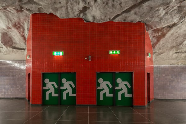 Picture of Running Man Exit Sign in the Stockholm Metro