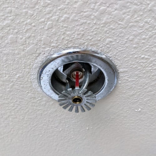 Fire sprinkler without missing fire sprinkler escutcheon
