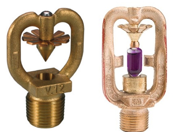 Open vs. closed water spray nozzles